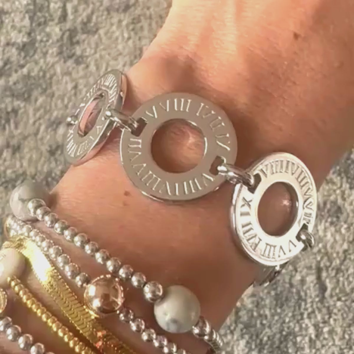 Circa Bracelet in 925 sterling silver features 6 flat rings imprinted with Bellagio & Co signature Roman numerals. Shop affordable luxury jewellery. Worldwide shipping from Australia.